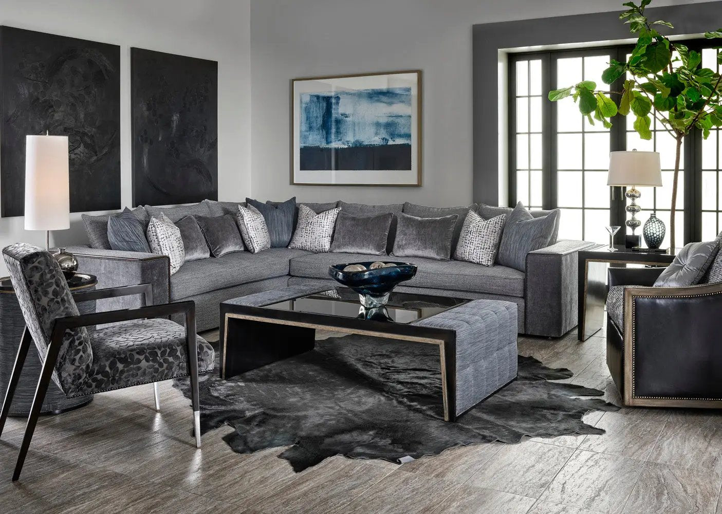 a living room filled with furniture and a large window