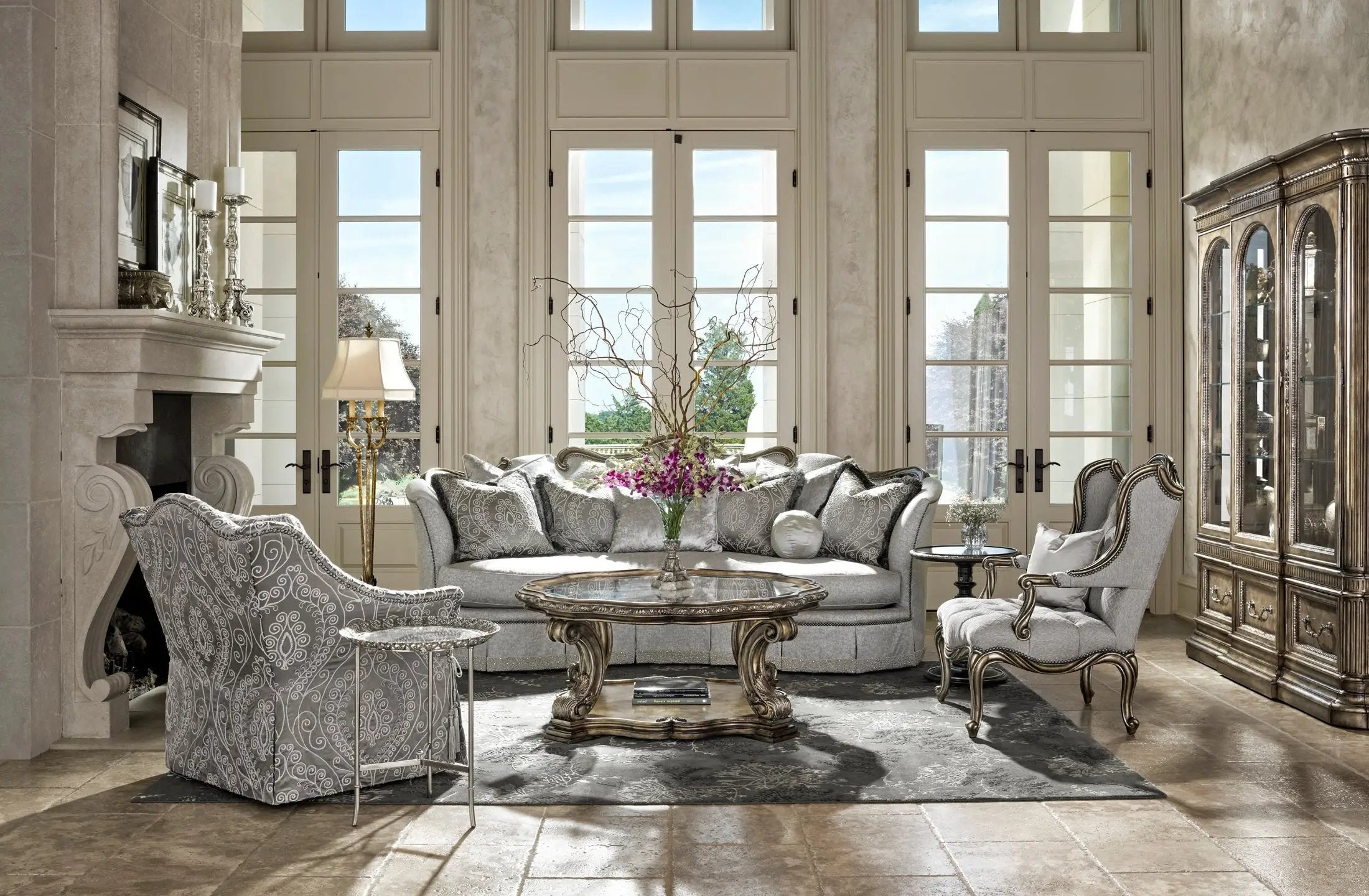a living room filled with furniture and a fire place