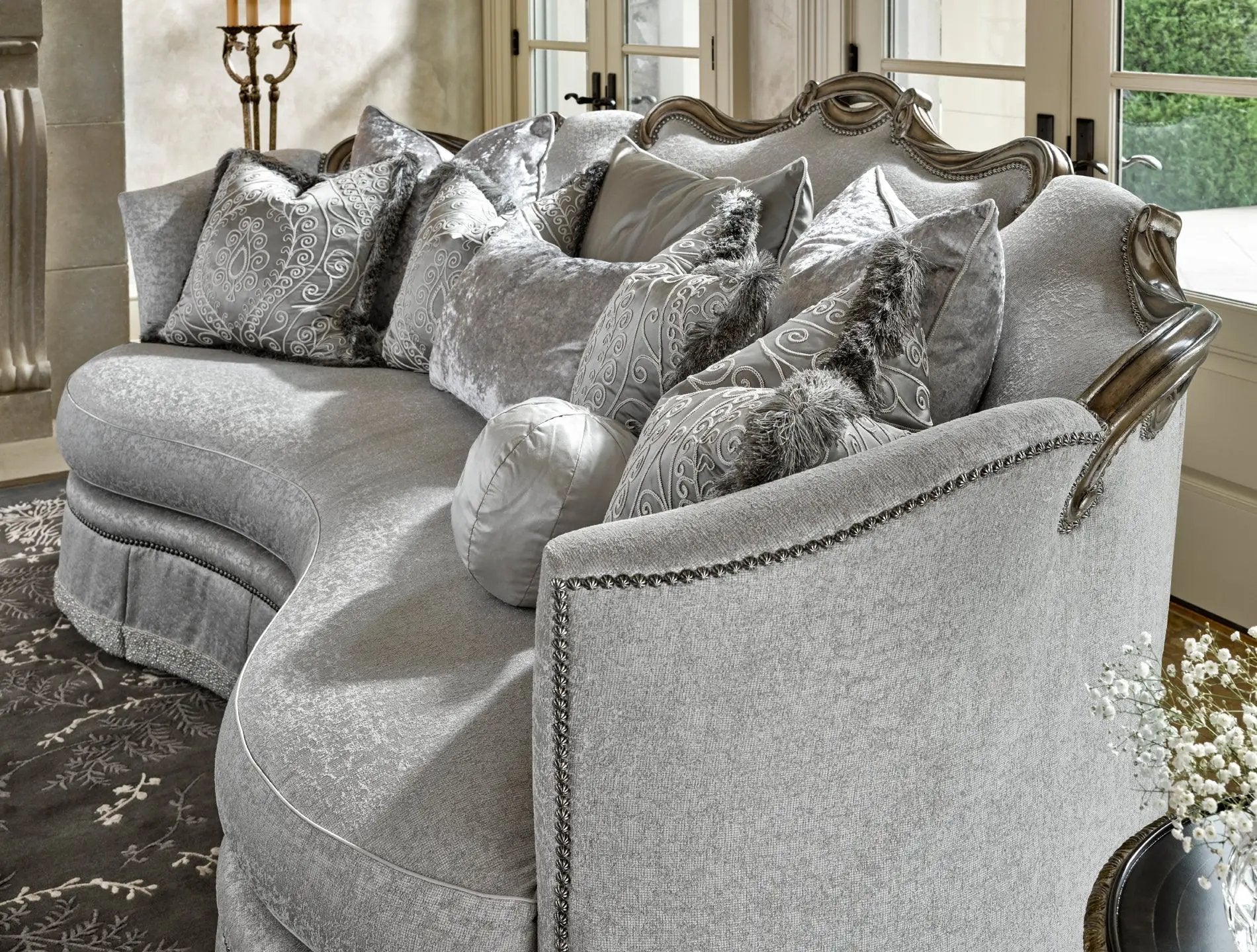 a living room with a couch and a chair