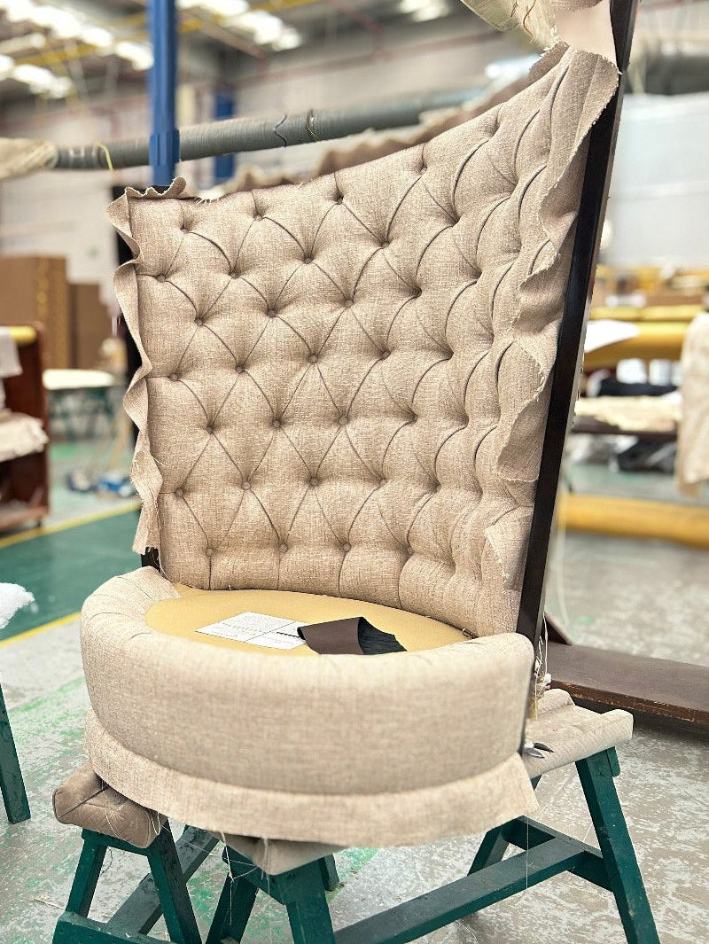 Upholstering a chair back by hand